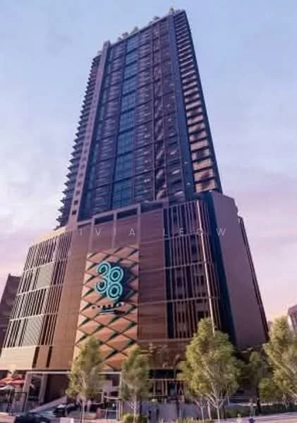 Exterior type: high-rise condominium; features: glass curtain wall, exposed concrete facade, projecting balconies, feature lighting at night, approximately 20-storey high-rise, manicured lawn, mature trees, surrounded by urban landscape; style: modern.