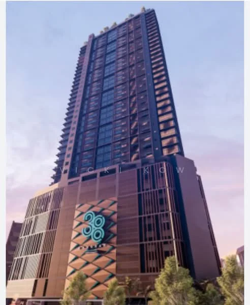 Exterior type: high-rise condominium; features: glass curtain wall, brown painted facade, recessed balconies, feature lighting at night, approximately 20-storey high-rise, landscaped greenery at base; style: modern.